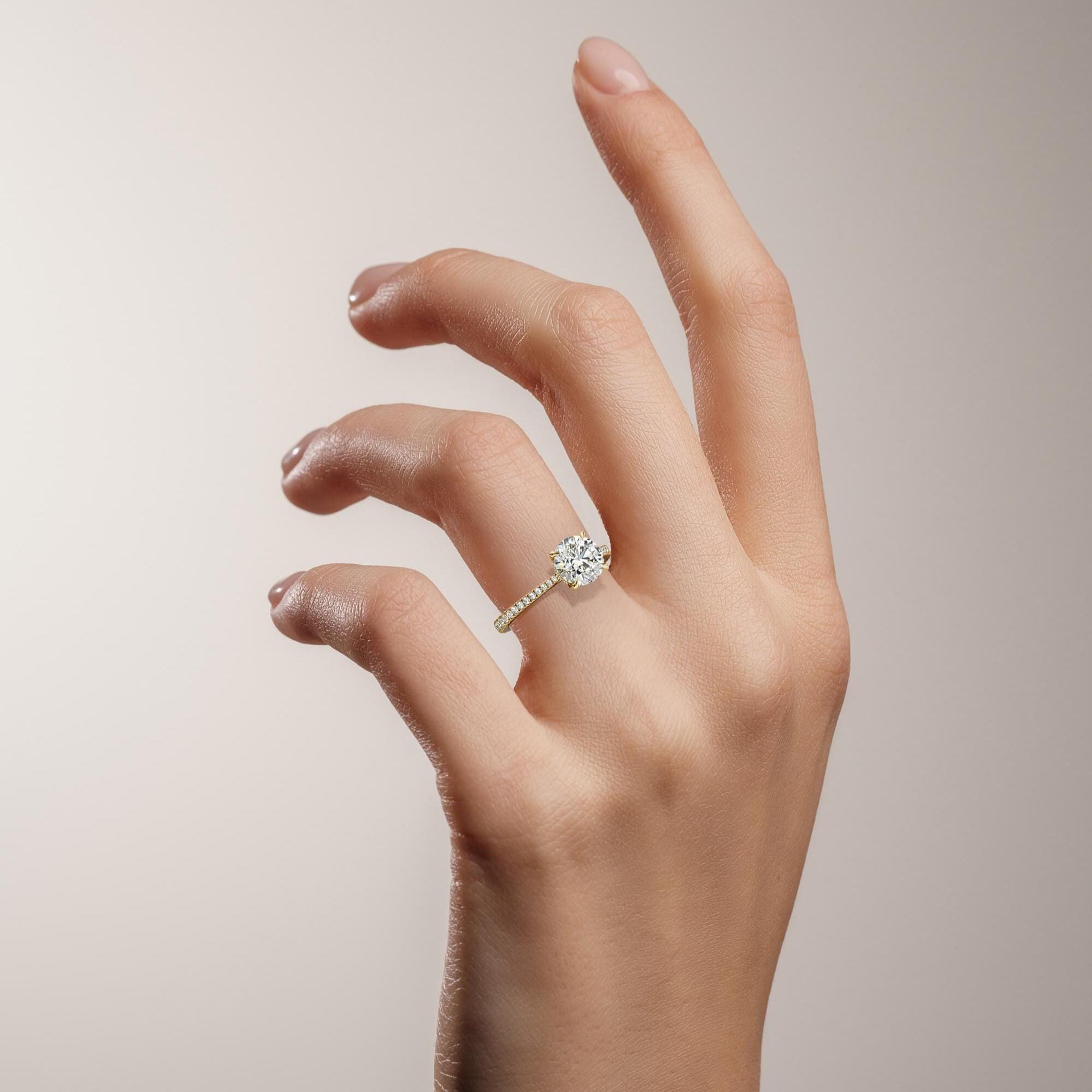 14kt Gold Pave Set Halo Graduated Round Shaped 1.50 Ct Solitaire Diamond Engagement Ring