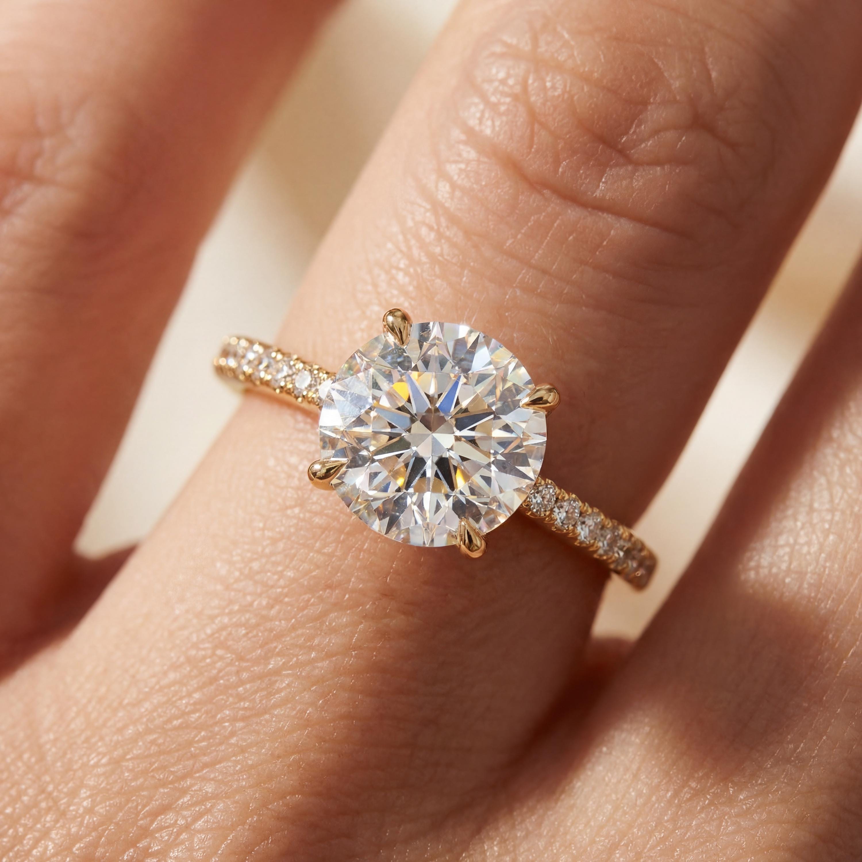 14kt Gold Pave Set Halo Graduated Round Shaped 1.50 Ct Solitaire Diamond Engagement Ring