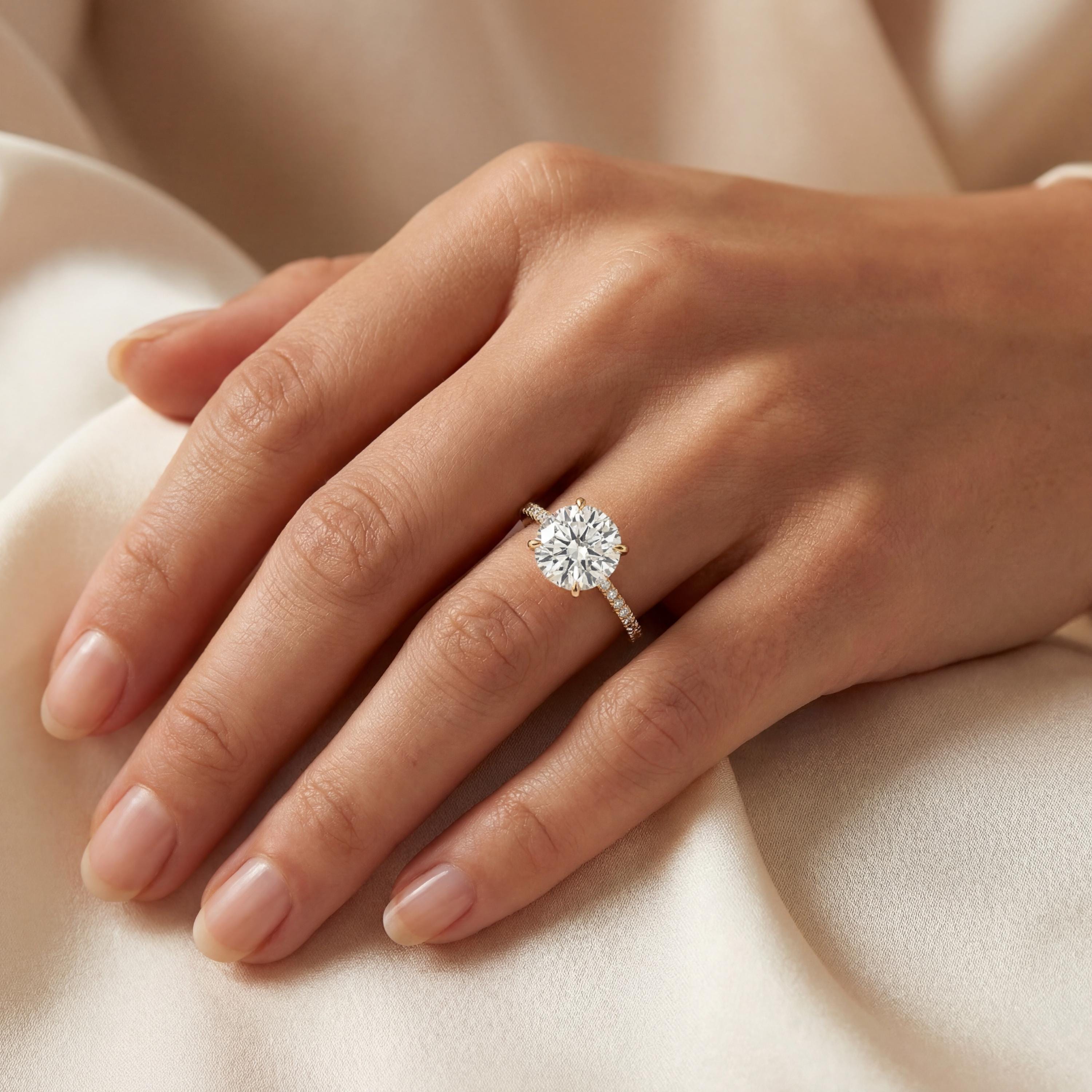 14kt Gold Pave Set Halo Graduated Round Shaped 1.50 Ct Solitaire Diamond Engagement Ring