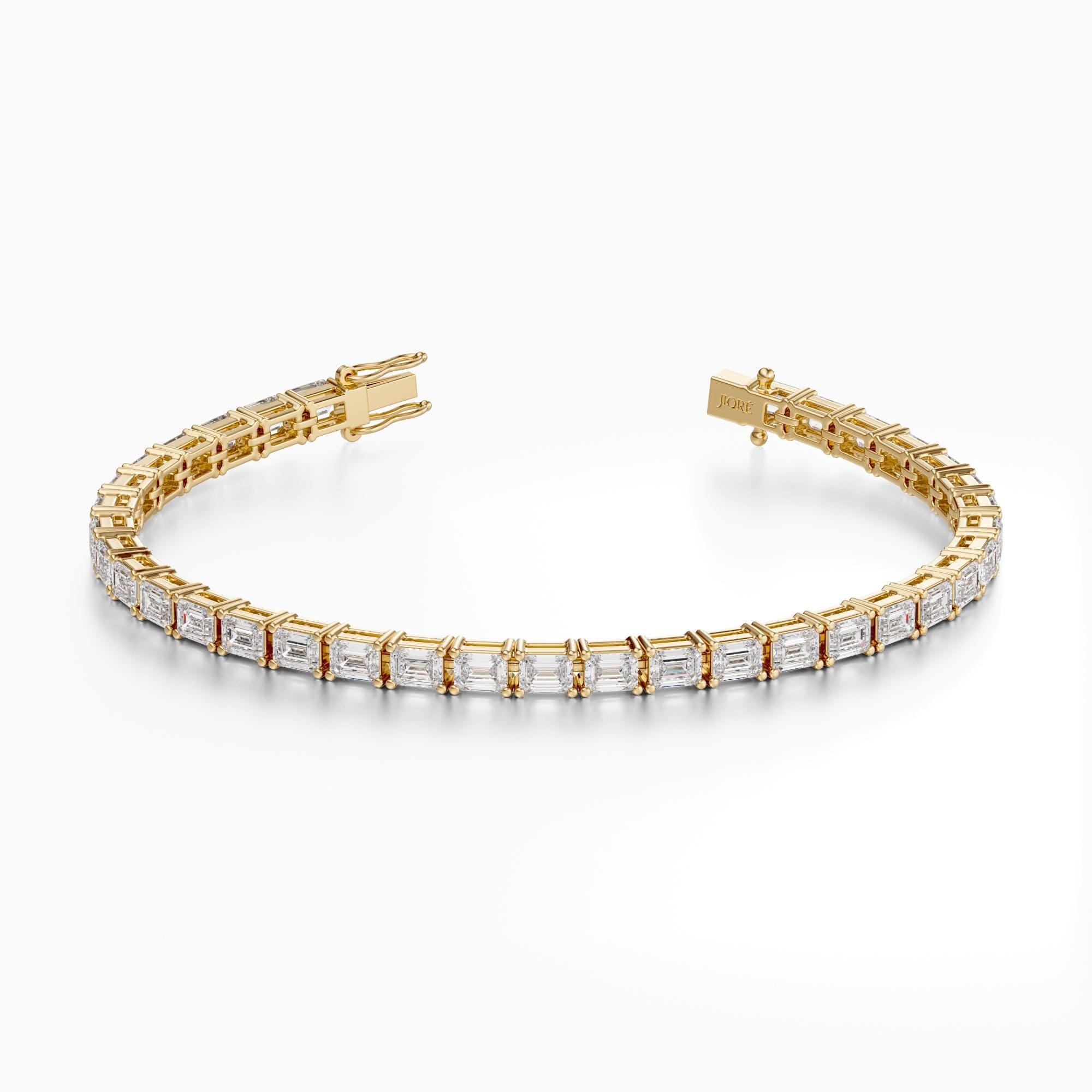 14Kt Gold Prong Set Emerald Cut 7.75 TCW Diamond Tennis Bracelet