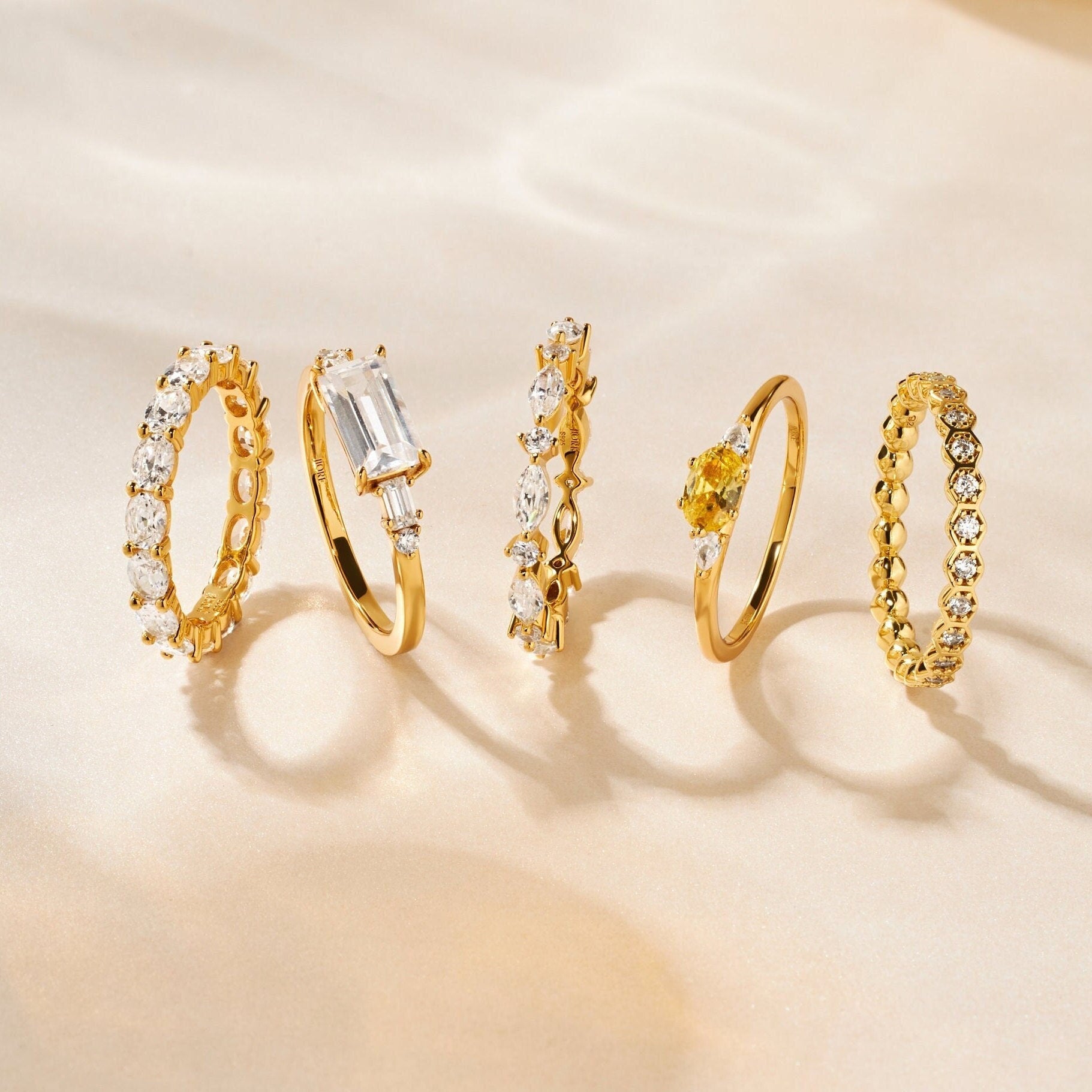 Opulent Oval Cut Gold Eternity Band