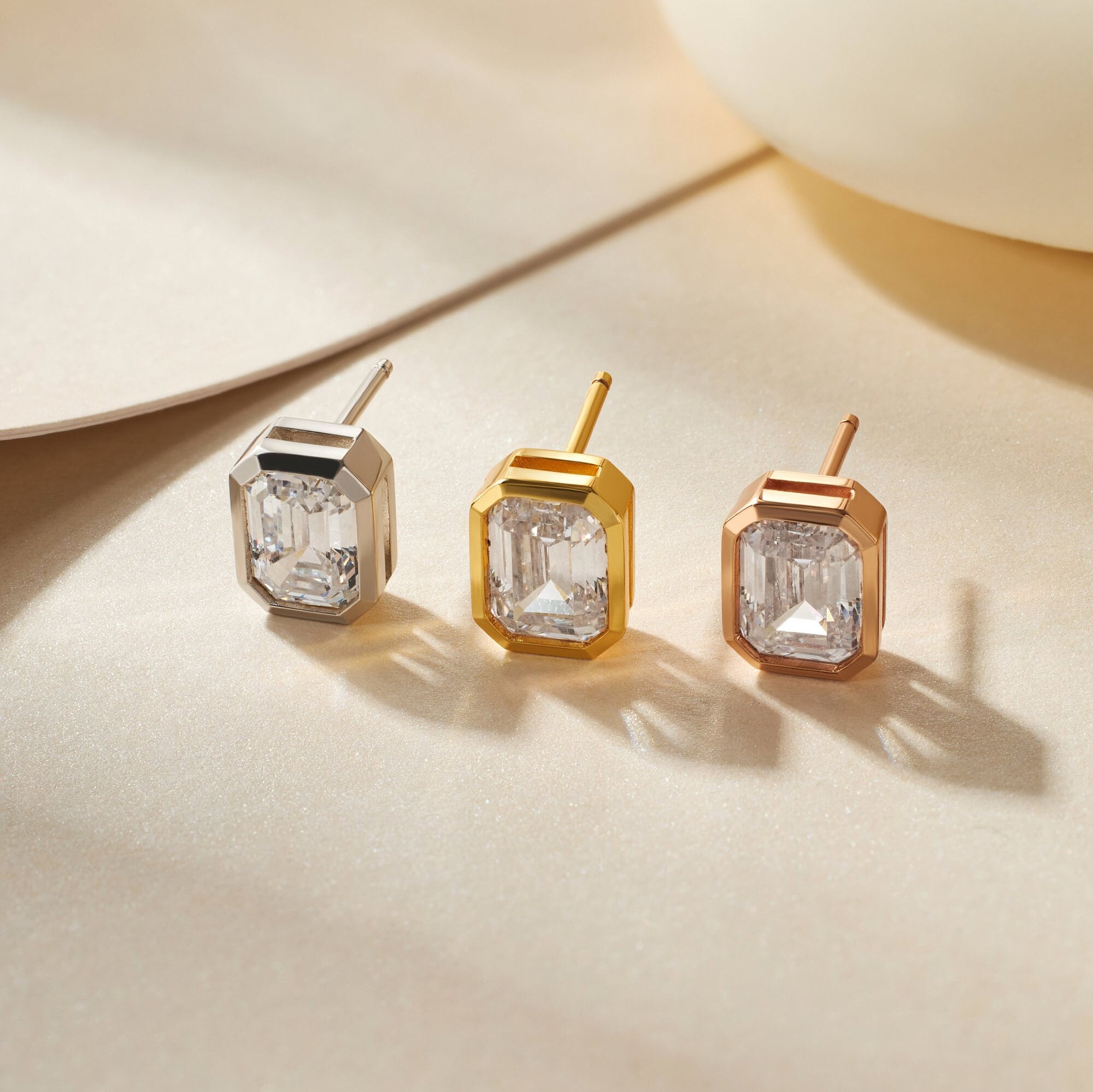 18K Gold Diamond Earrings: Emerald Cut Studs